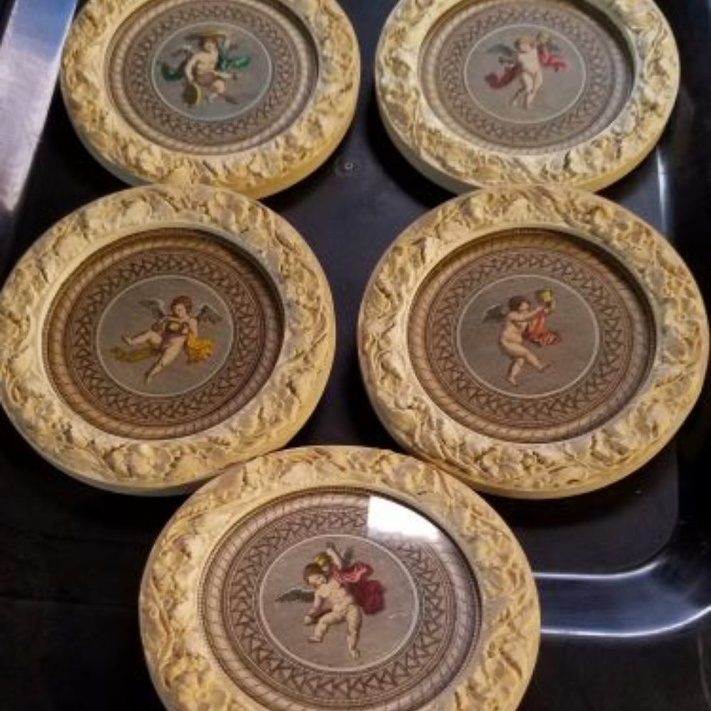 5 cherub wall hangings